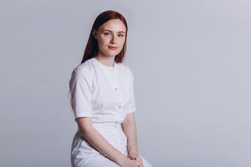 Beauty woman doctor in medical uniform on isolated background. Protection, epidemic, medicine, health care lifestyle concept