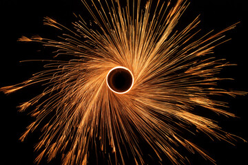 Sparks on a black background. Holiday fireworks.