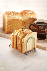 slices of bread with black coffee