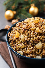 Traditional Christmas slavic dish kutia in bowl, closeup
