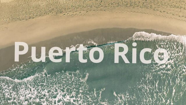 Puerto Rico words being revealed with the shadow of a flying airplane on the beach