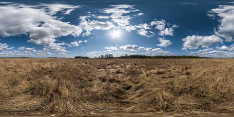 Fototapeta na wymiar 360 hdri panorama view among farming fields near village with sun with clouds in sky in full seamless equirectangular spherical projection, ready for VR AR virtual reality content