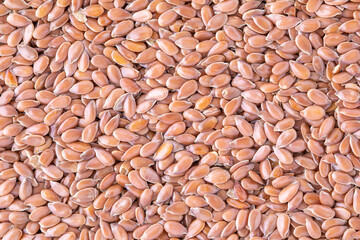 Flax seeds background, close up, linen seeds brown, organic food