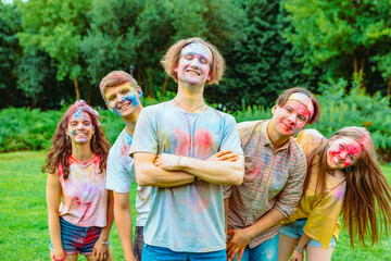 Fototapeta premium young happy friends at holi fest