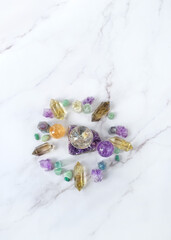 different crystal gemstones on marble background. Minerals set for esoteric ritual, spiritual Magic...