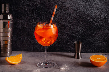 Glass of cold Aperol spritz cocktail.