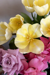 Naklejka na ściany i meble flower shop. Lots of flowers in vases. Opened yellow tulip