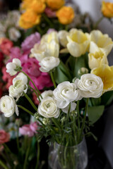 flower shop. Lots of flowers in vases. Ranunculus