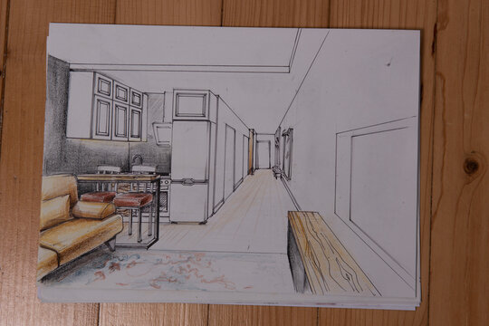 The photo shows sketches, a design project drawn with pencils on a piece of paper. Drawings, sketches, pencils, stationery on the table.
