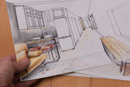The photo shows sketches, a design project drawn with pencils on a piece of paper. Drawings, sketches, pencils, stationery on the table.