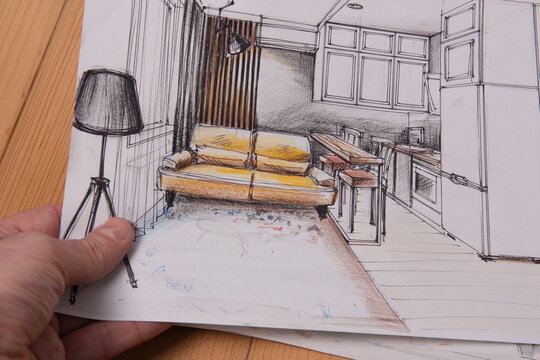 The photo shows sketches, a design project drawn with pencils on a piece of paper. Drawings, sketches, pencils, stationery on the table.