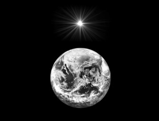 Dark night sky with bright star over planet Earth. Black and white. Christmas Star of Bethlehem...