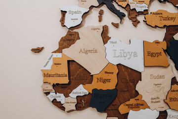africa map outlines on wooden background.