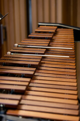 Close up of xylophone instrument with two mallets in a philharmonic