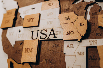 Made in the USA wood sign of US wood map with stars on weathered whitewash wood