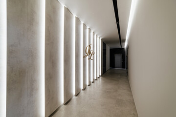 Obraz premium bright interior of the corridor with lighting and black lamp
