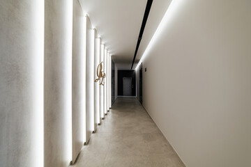 stylish interior design of the corridor with lighting in the new house
