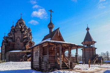 museum complex of Russian wooden architecture in the open air - church, chapel and bell tower in the ethno estate Bogoslovka near St. Petersburg