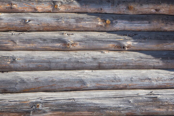 Old wooden log house wall background texture