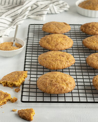 Pumpkin cookies on the cooling rack in the kitchen atmosphere