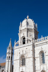 Fototapeta na wymiar The Jeronimos Monastery or Hieronymites Monastery facade and courtyard parish of Belém, in the Lisbon municipality, Portugal
