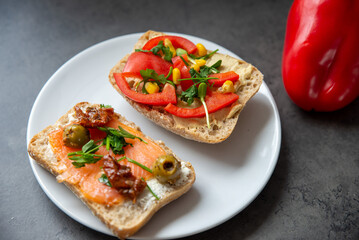 Tasty homemade breed with vegetable on stone background