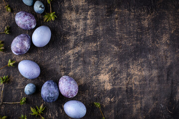 Festive Easter eggs in purple and blue color