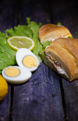 delicious crispy croissant sandwich with egg and tuna