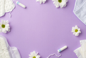 Top view photo of hygienic pads tampons lingerie and camomile buds on isolated pastel purple background with empty space in the middle