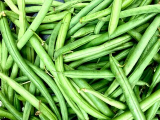 Fresh organic green beans (french beans) on a street market in London. England.