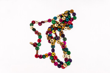 Beaded string of colored buttons isolated on white.