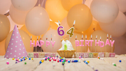 Beautiful background happy birthday number 64 with burning candles, birthday candles pink letters...