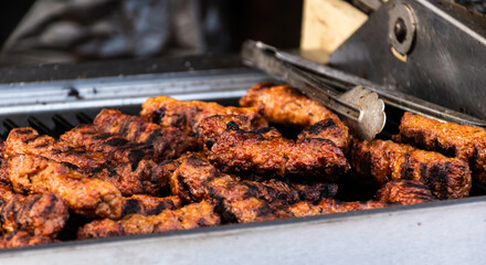 Romanian traditional food mici or mititei. Minced meat rolls.