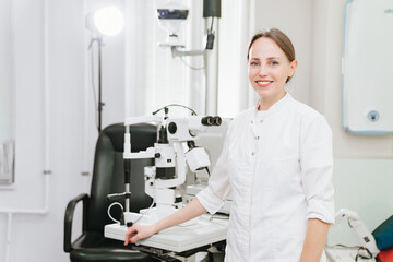 Attractive woman ophthalmologist in ophthalmology clinic. optics salon.