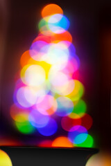 Magic circle colourful lights from black vase vibrance colour for celebrate a festival party.