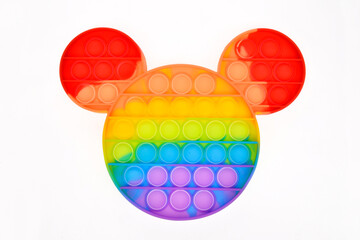 Pop it silicone rainbow anti-stress toy isolated on white background. Simple dimple, popular modern stress relief toys for adults and children. Fidget kid toy, Pop Bubble Fidget.