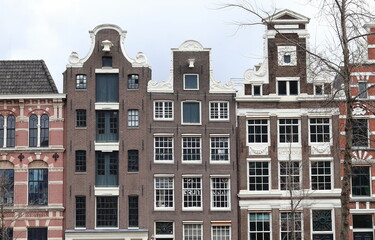 Fototapeta na wymiar Amsterdam Oude Turfmarkt Street Historic Building Facades, Netherlands
