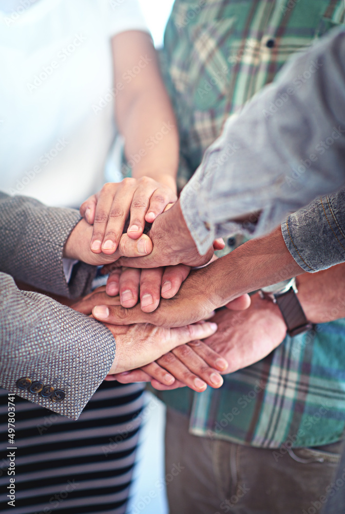 Aufkleber this team has each others backs. closeup shot of a group of coworkers with their hands in a huddle.