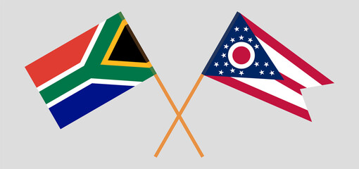 Obraz premium Crossed flags of South Africa and the State of Ohio. Official colors. Correct proportion