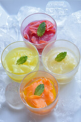Fototapeta na wymiar Four kind of Fruits Sorbet with ice in the white bowl, Summer image
