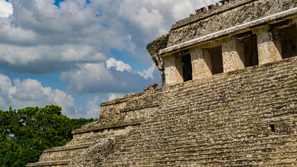 ancient Mayan pyramid in the jungle of Chiapas, Mexico and blue sky