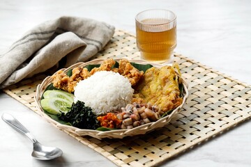 Nasi Campur Medan. Street food meal of rice with variety of Malay side dishes
