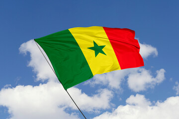 3d illustration. A beautiful view of Senegal flag on a sky background.
