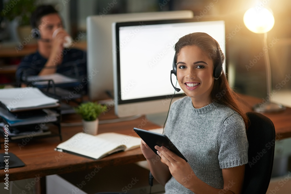 Poster looking up ways to help the customer even more. shot of young agents working in a call center.