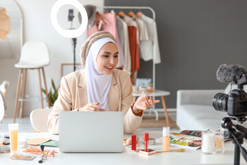 Muslim beauty blogger recording video in dressing room