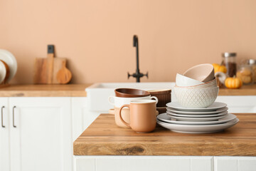 Fototapeta na wymiar Set of clean tableware in kitchen