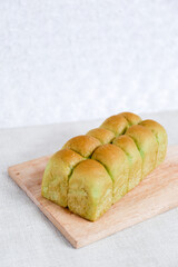 Green Pandan Japanese Milk Bread on a white background. Food Baking concept Fresh baked organic homemade soft milk loaf bread.	
