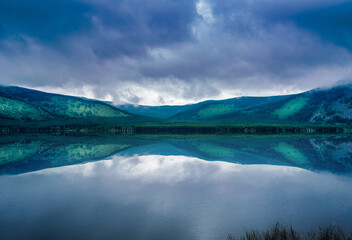 beautiful lake with mountain, big fog