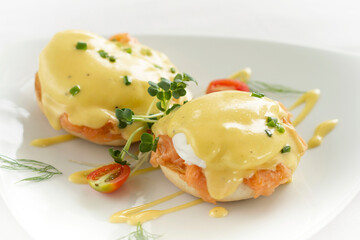 eggs benedict royale breakfast with smoked salmon and hollandaise sauce - 497822157