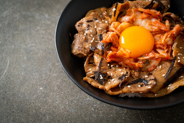 pork bulgogi rice bowl with kimchi and Korean pickled egg
